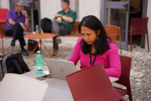 young woman working on laptop